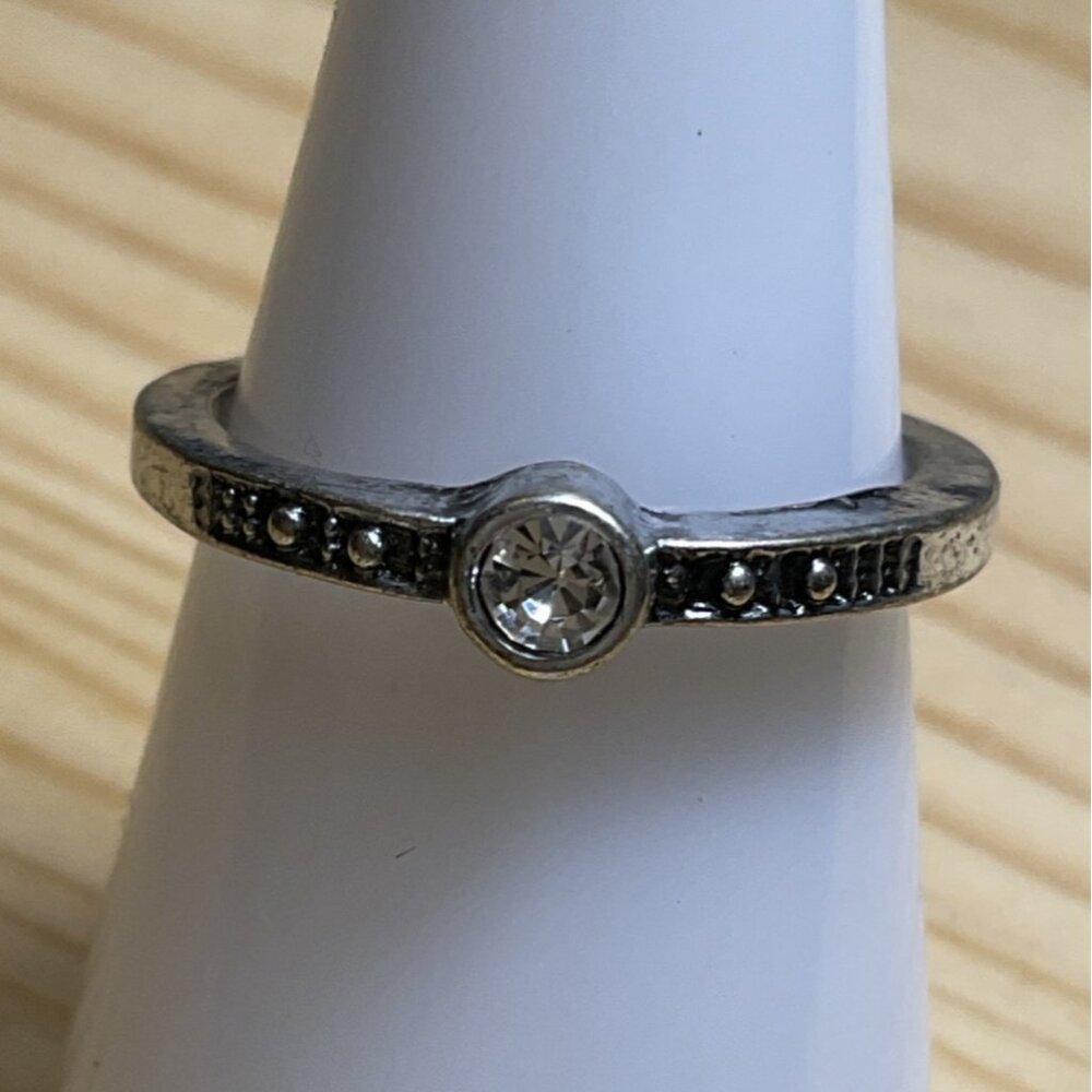 Silver Band Ring With Center Clear Gemstone & Accent Details